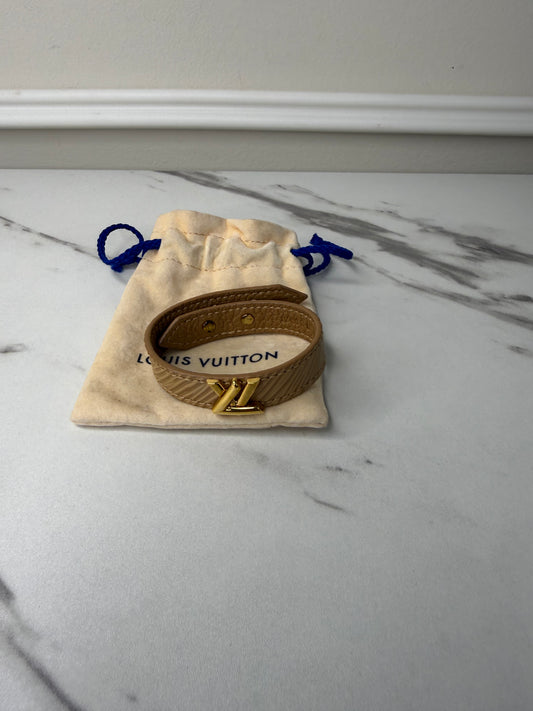 Louis Vuitton Camel Epi Leather Twist Bracelet with a gold-toned logo turn lock