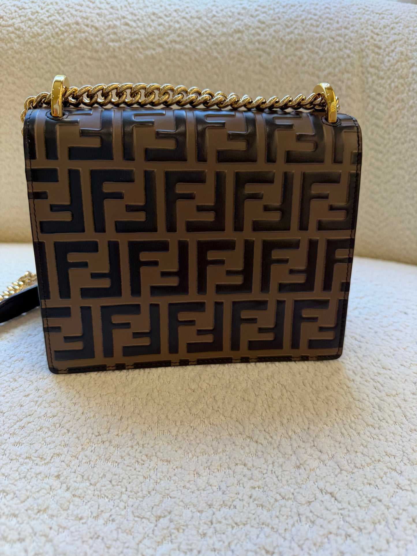 Fendi bag with the FF embossed pattern and FF turn-lock hardwear