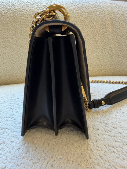 Fendi bag with the FF embossed pattern and FF turn-lock hardwear