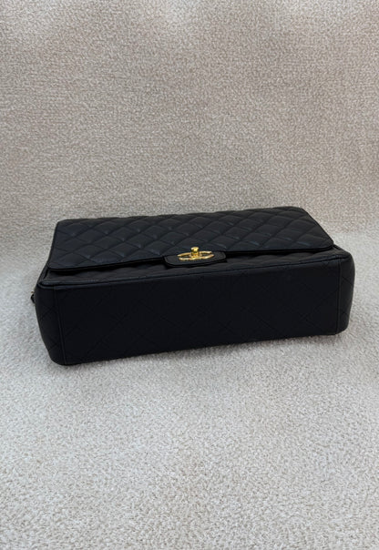 Chanel caviar maxi classic flap black gold