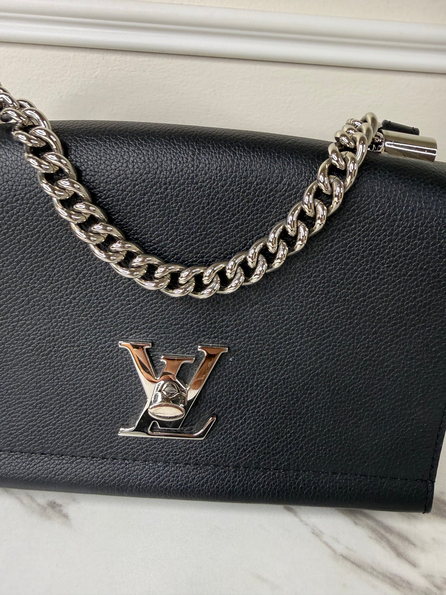 Louis Vuitton Lockme II BB bag in black grained calfskin leather with silver-tone hardware