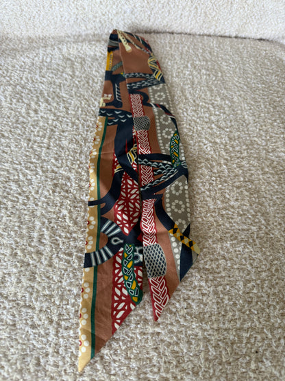 Hermes Twilly 86 silk scarf in a multicolour "Fantaisie D'Etriers" patte