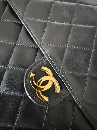 Chanel Vintage black quilted lambskin leather flap bag with gold-tone hardware