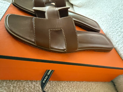 Hermes’ Oran sandals gold size 38