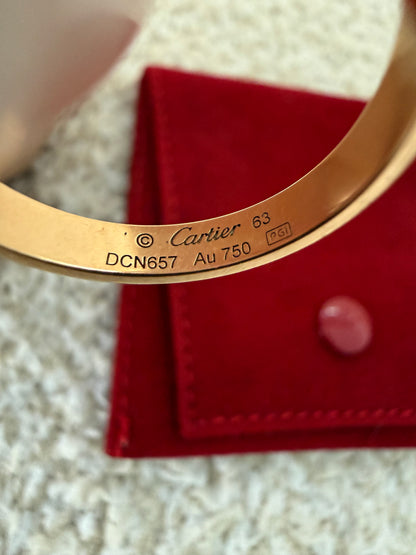 Cartier love ring goes good size 63
